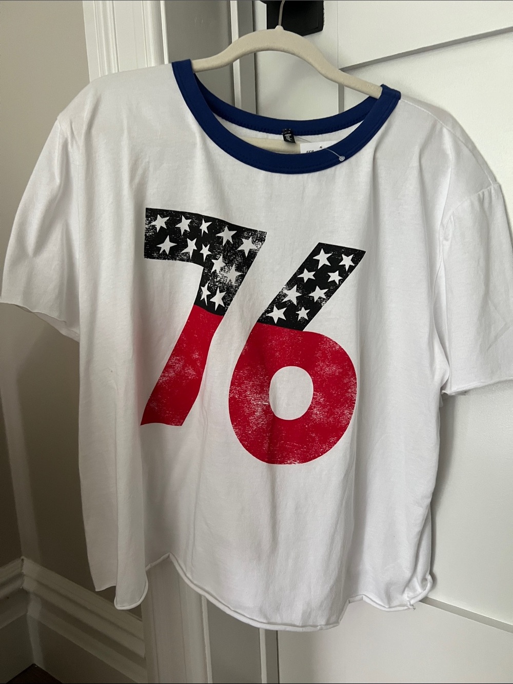 Junior Girls-White Graphic Tee with Blue Neckline and Red Number